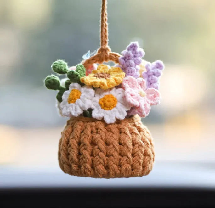 Green and white knitted rope car plant ornament with 8cm base and hanging rope.