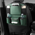 Leather car seat back storage bag in black, brown, green or grey colour hanging behind vehicle seat