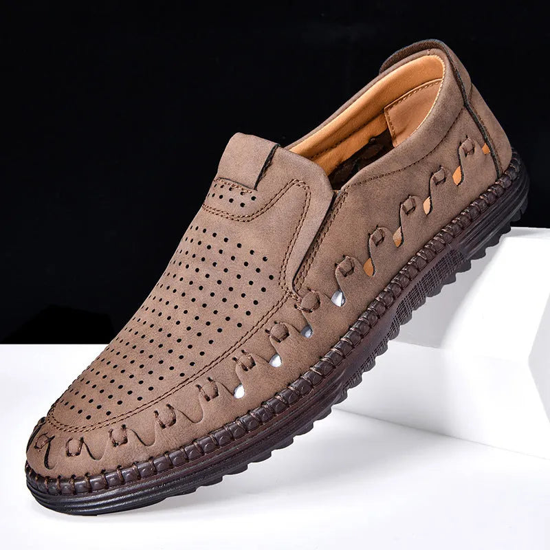 Men's brown casual slip-on shoes with round toe and flat PU leather upper.