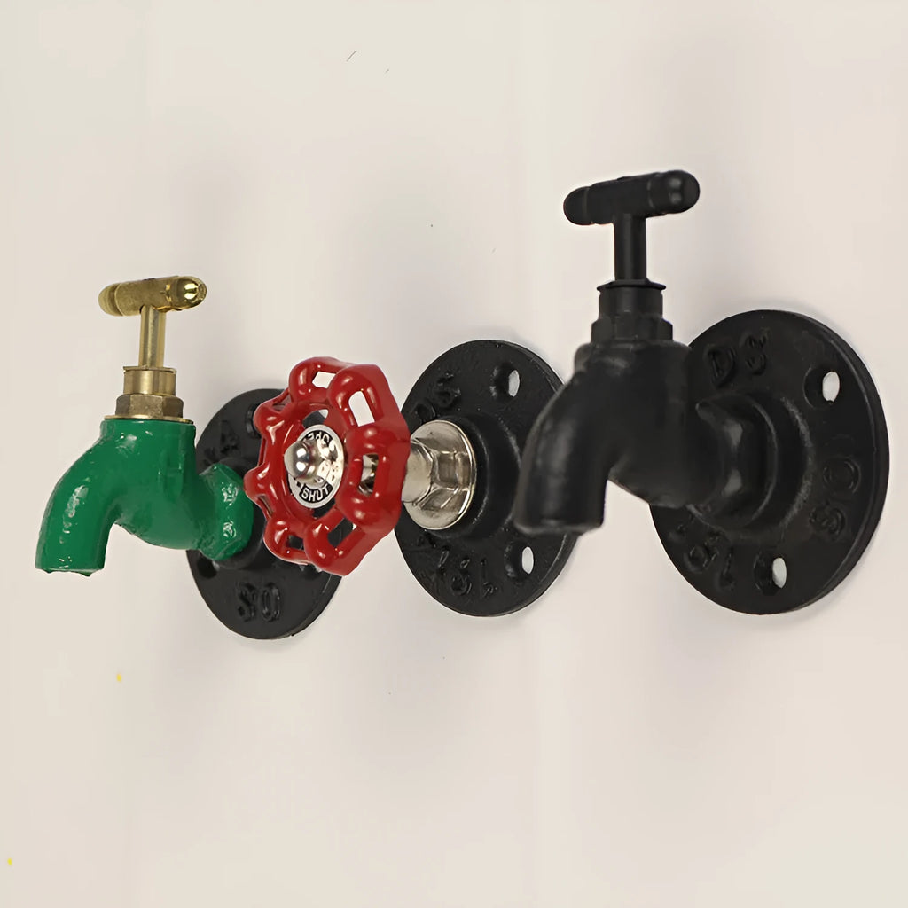 Water pipe style polished metal wall hook for hanging towels and clothes in a choice of three colours.