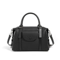 Black genuine leather ladies handbag with single shoulder strap, showing contrast lock and stitching.