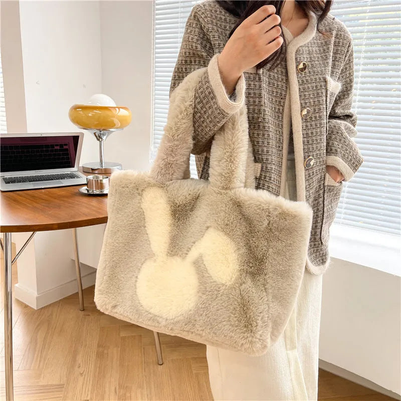 Plush shoulder bag with cartoon rabbit ears design in solid colour options