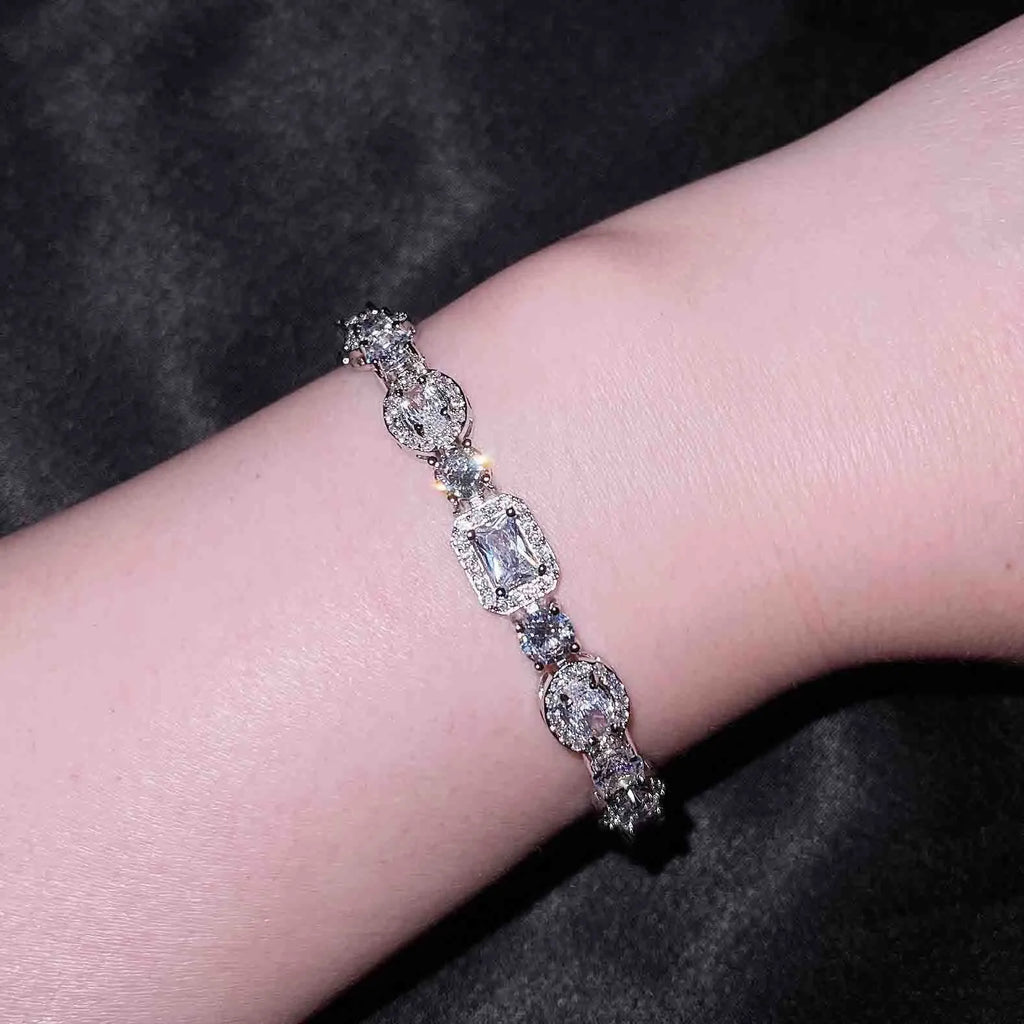 Women's sterling silver plated bracelet with zircon inlaid stones in geometric luxury style