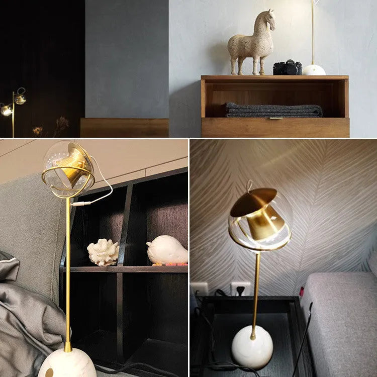 Glass desk lamp with dimmable LED light and touch switch control on wooden surface