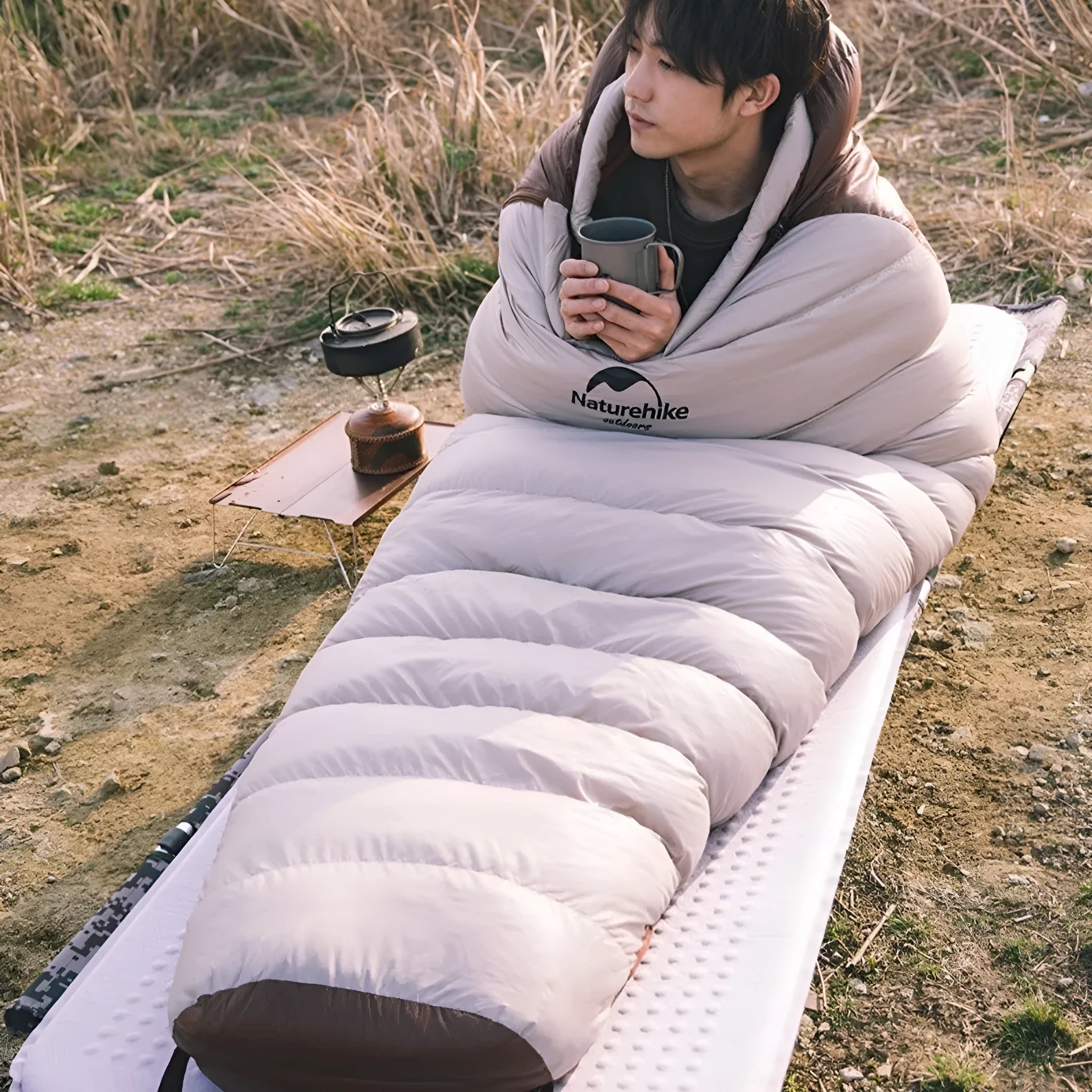 Goose down mummy sleeping bag for adults in Snowbird colour with storage bag