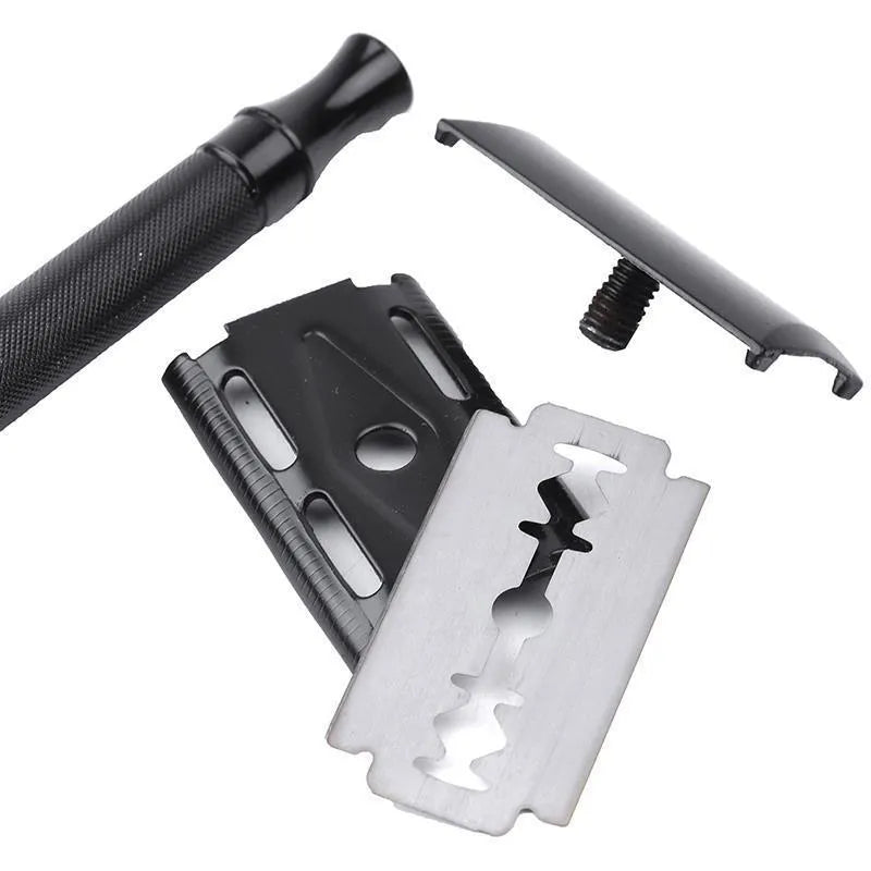 Traditional manual shaving set with safety razor, natural bristle brush and metal scraper tool