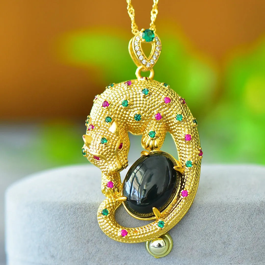 Flat grey Hetian Jade pendant with copper inlay and blue jadeware detail on a silver chain.