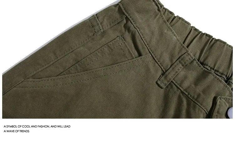 Casual wide-leg cropped shorts in apricot colour with mid waist and micro-elastic fabric.
