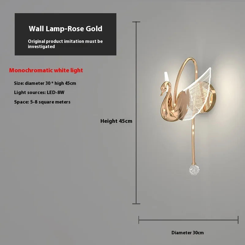 Gold modern swan-shaped wall-mounted bedside lamp with acrylic shade and dimmable LED light.