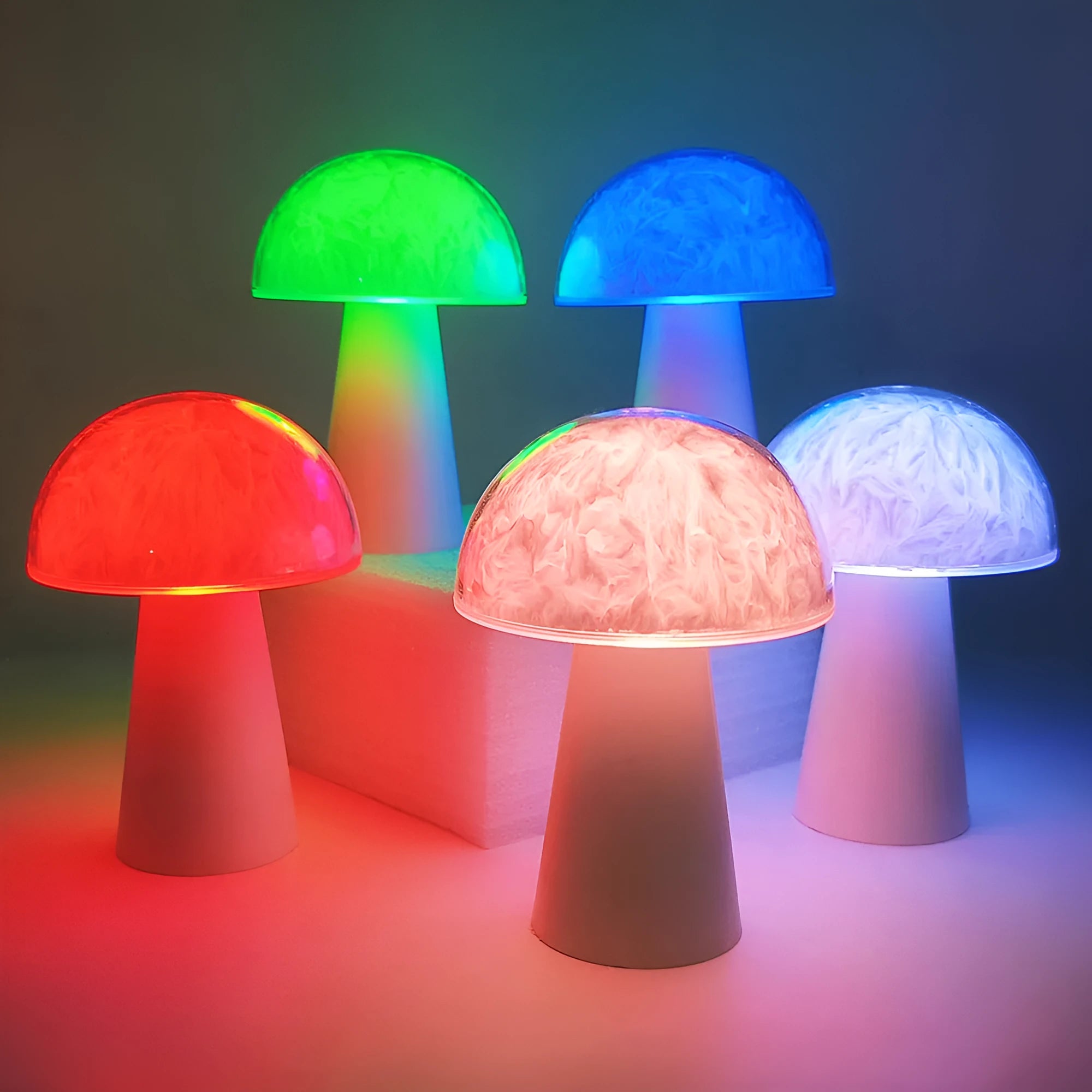 Mushroom-shaped remote control night light with RGB colour changing on wooden surface