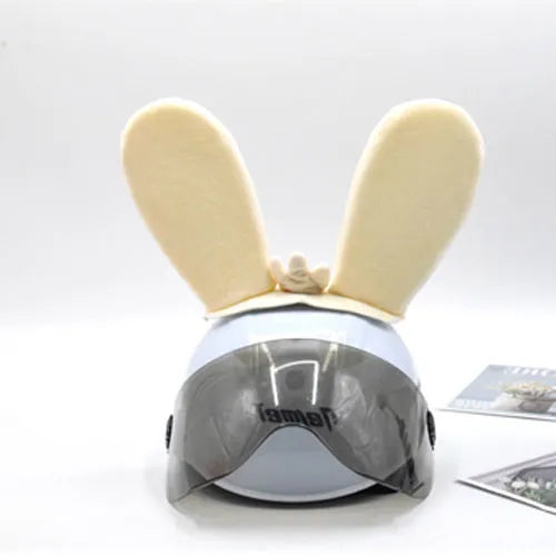 Rabbit Glow Ears helmet ornament with Velcro bottom in multiple colour options including blue, yellow, red, and purple.