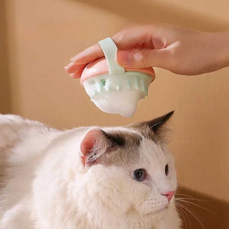 Pet silicone bathing brush for cats and dogs, available in blue, pink, white, and yellow