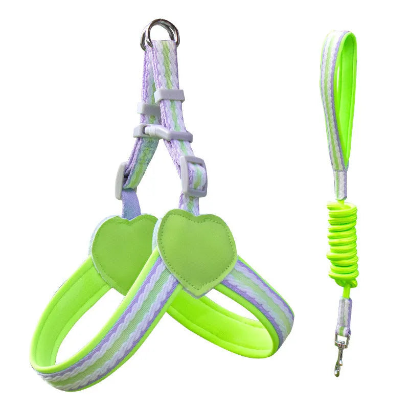 Nylon dog walking chest strap vest with an attached hand holding rope, shown in emerald green.
