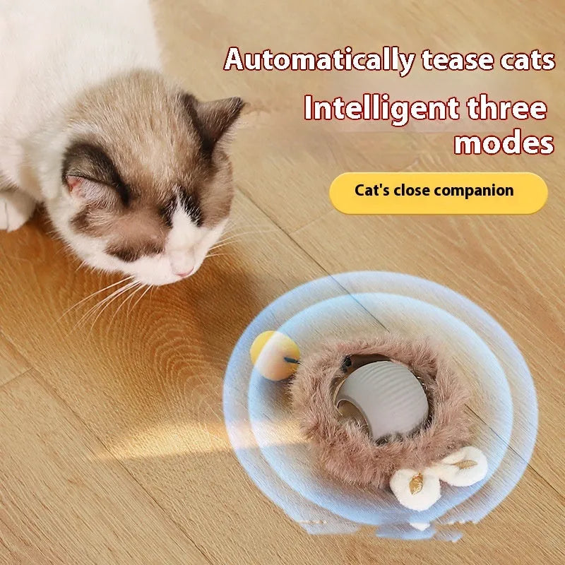 Flexible silicone rolling ball cat toy in plush red, green, and grey colours
