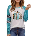 Sky blue long sleeve t-shirt with a detailed 3D printed Halloween pumpkin design on the front.
