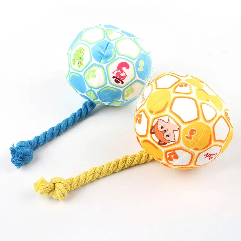 Blue and yellow elastic football dog tug toy with cotton rope construction for interactive play