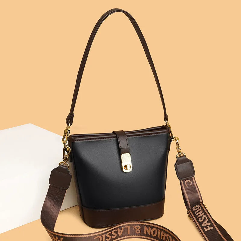 Korean style black bucket messenger bag with adjustable straps and multiple internal compartments