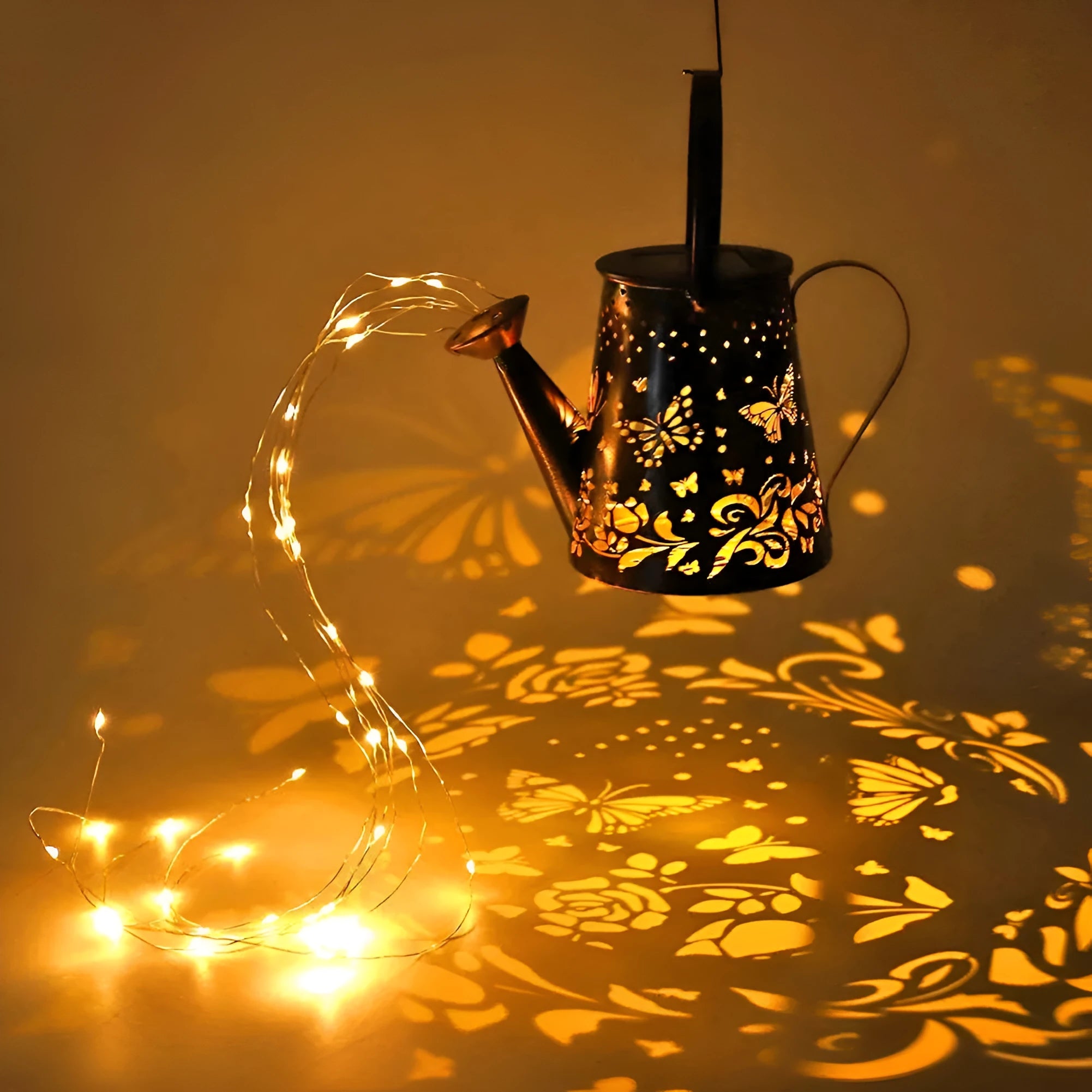 Tapered butterfly pattern iron solar garden lamp with warm white LED light.