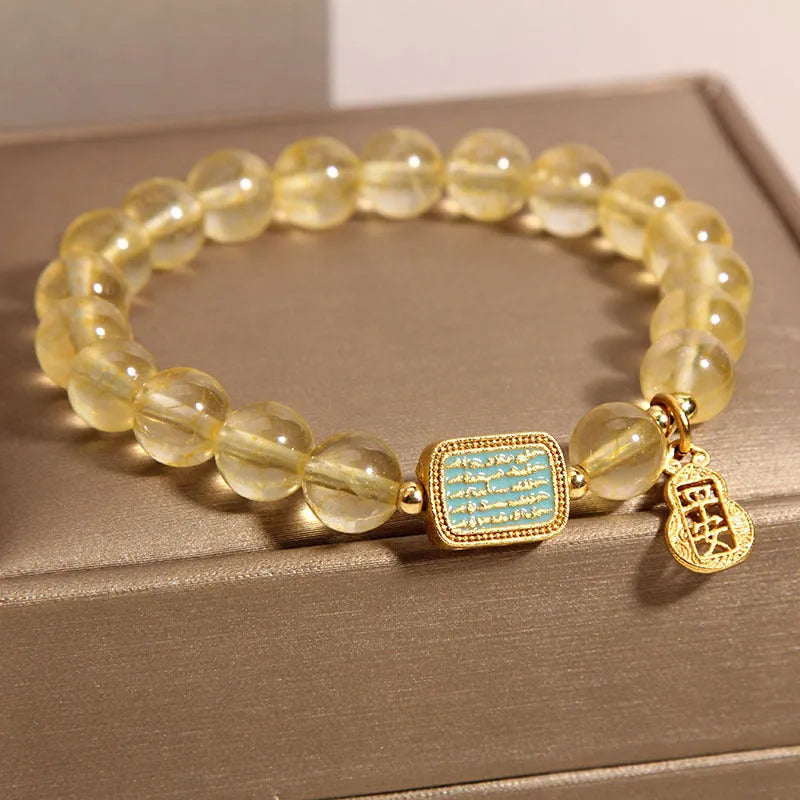 Women's natural citrine crystal bracelet with yellow colour and rhinestone detailing