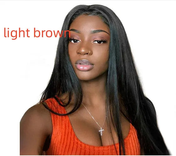 Long straight black synthetic wig with centre-parted bangs on a model.