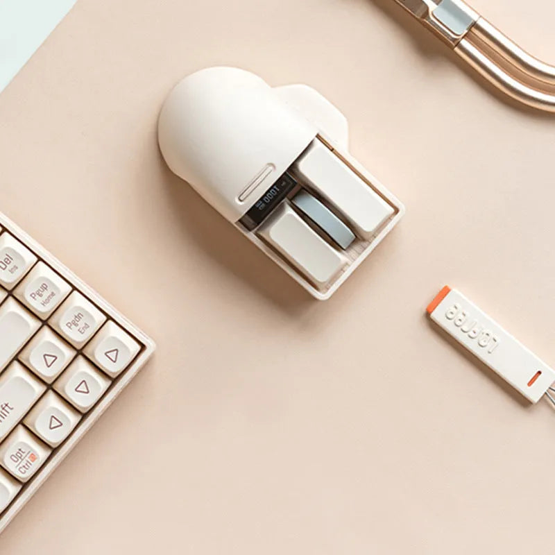 Xiaoqiao Three Mode Wireless Mouse in tofu colour showing seven buttons and four-way scroll wheel