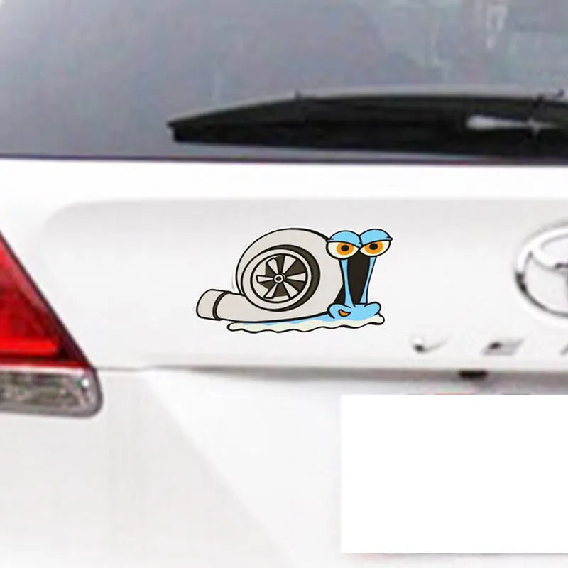 White reflective car sticker with a printed cartoon snail design, shown at 12cm by 8cm scale