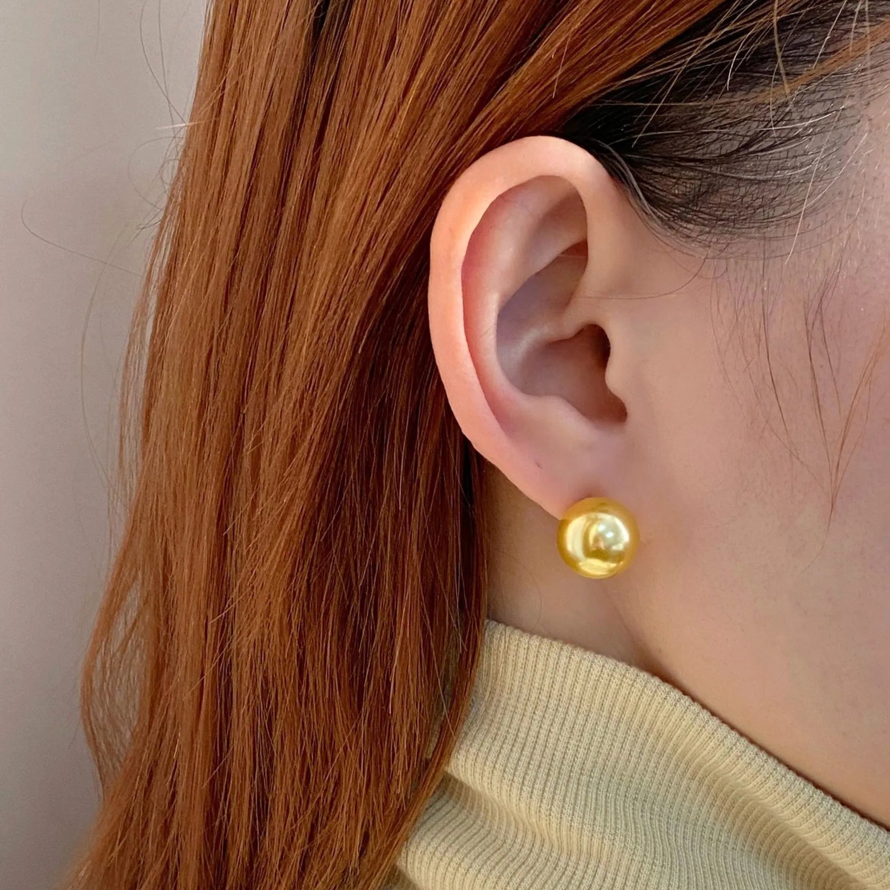Large geometric pearl stud earrings with retro styling and eight-awm star detailing in silver