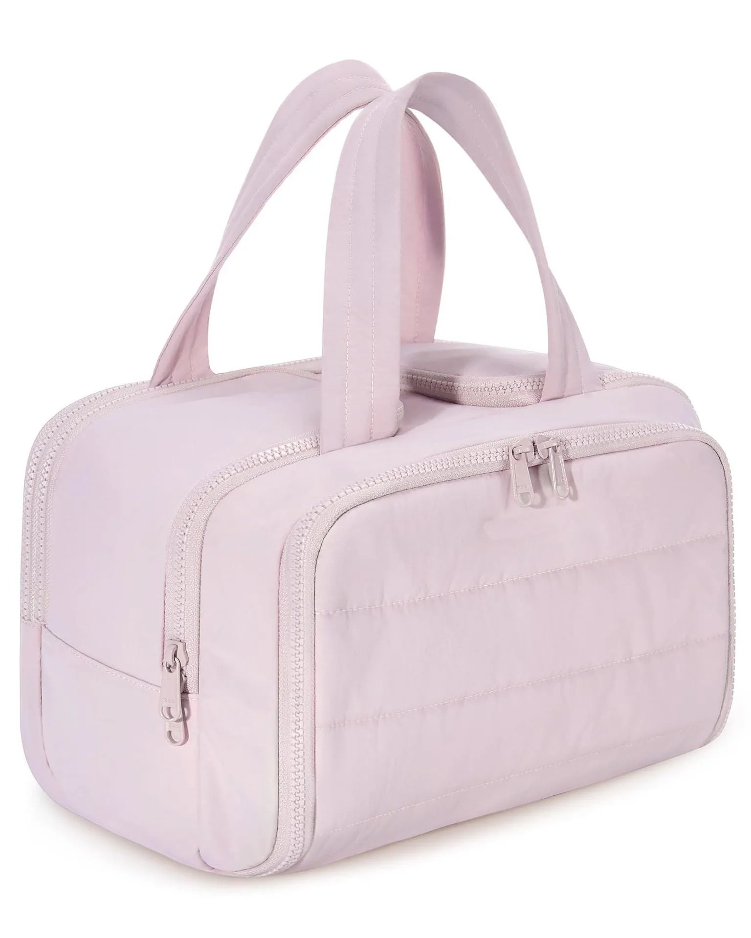 Large lightweight travel wash bag in beige colour with wide-opening design showing interior space