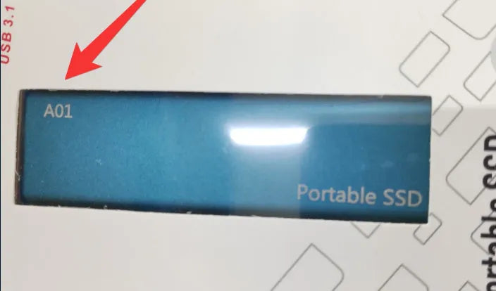 Ultra-thin metal external SSD portable hard drive in red, showing slim profile.