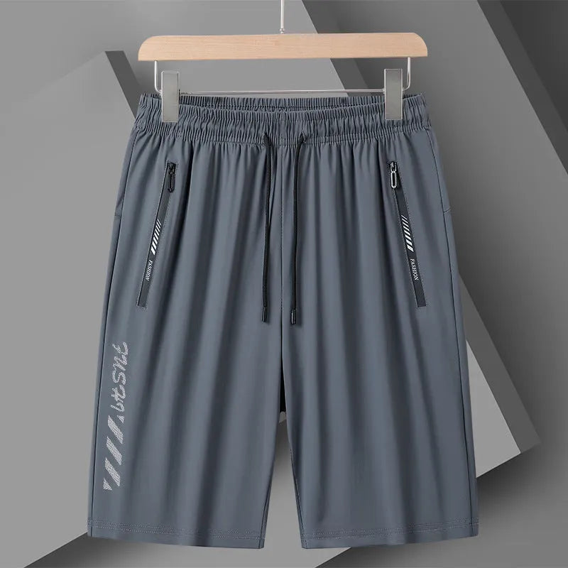 Men's quick-drying nylon sports shorts in black, loose fit with elastic waistband