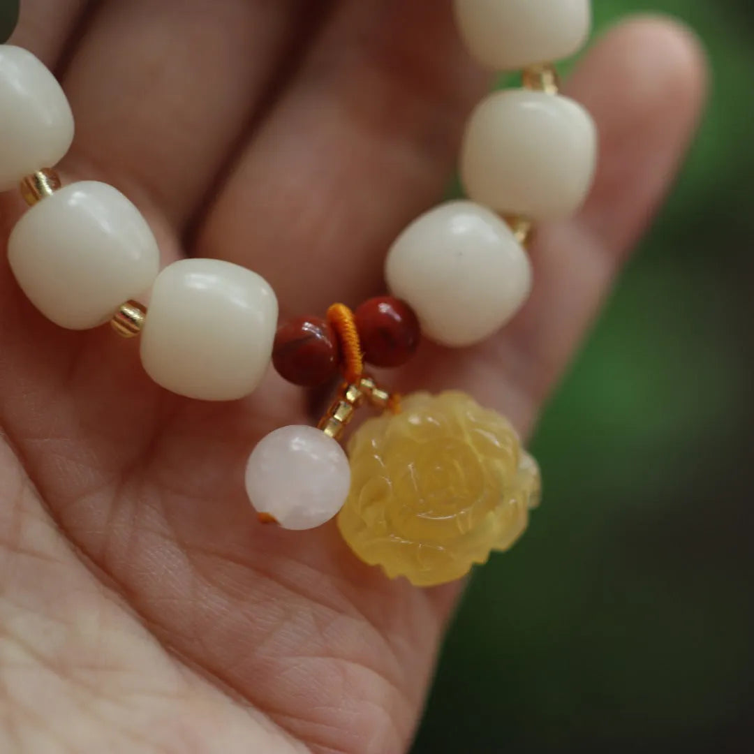 Gradient white jade Bodhi root bracelet with natural beeswax Lotus pendant on wrist