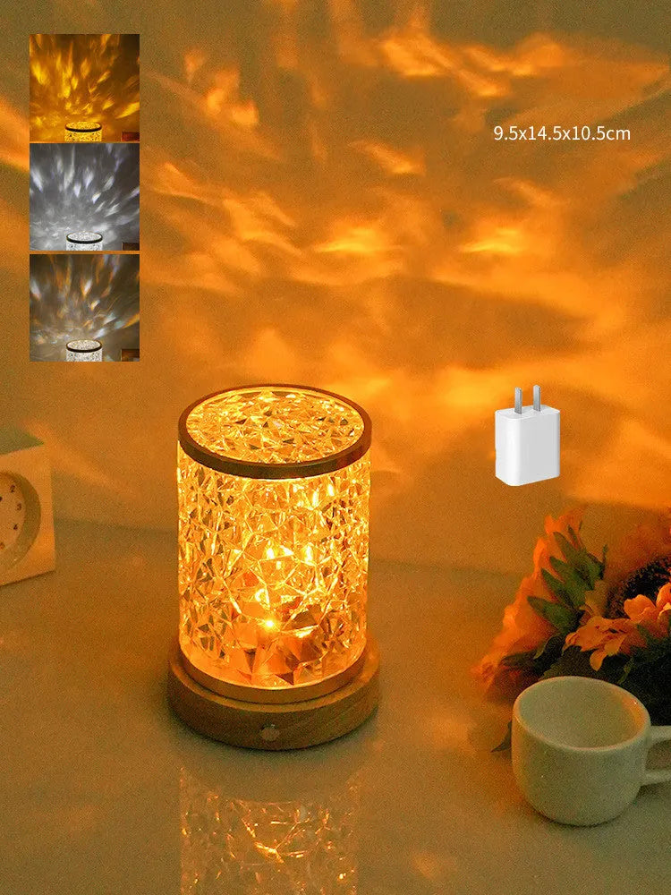 Rotating water ripple night light with acrylic dome on a solid wood base.