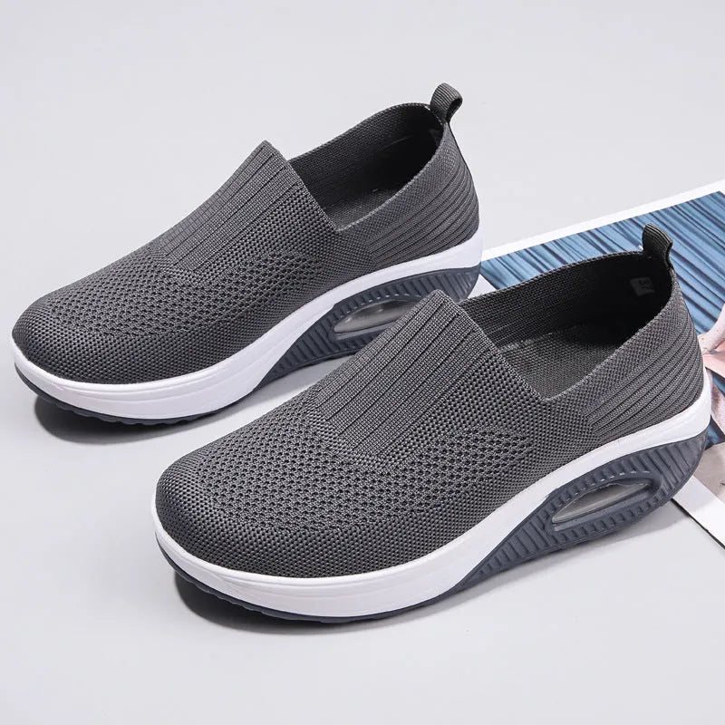 Women's mesh running shoes with air cushion technology in multiple colour options