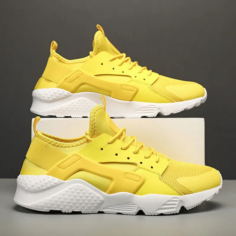 Men's casual low top shoes with mesh upper, cross straps, and flat heel in multiple colours