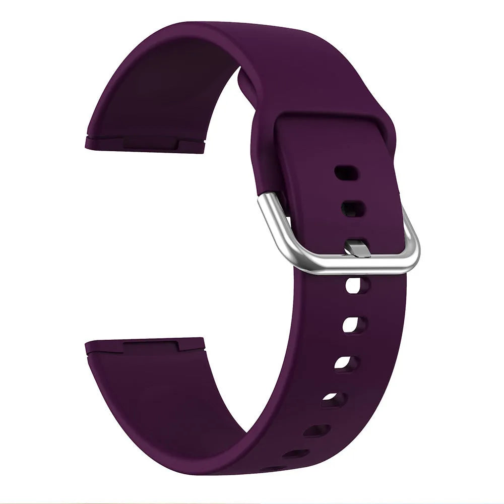 Solid colour silicone replacement strap with silver buckle for Fitbit Versa 3 and Sense 2 fitness trackers.