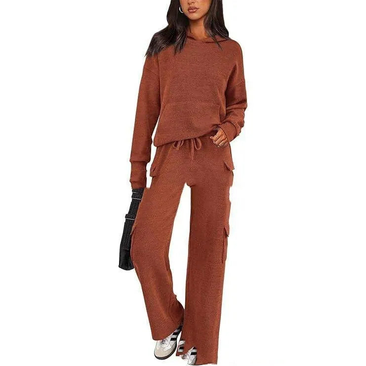Women's long sleeve leisure sport suit top and trousers set in polyester fabric.