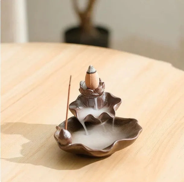 Square ceramic reverse flow incense burner with lotus and plum blossom decorative motifs