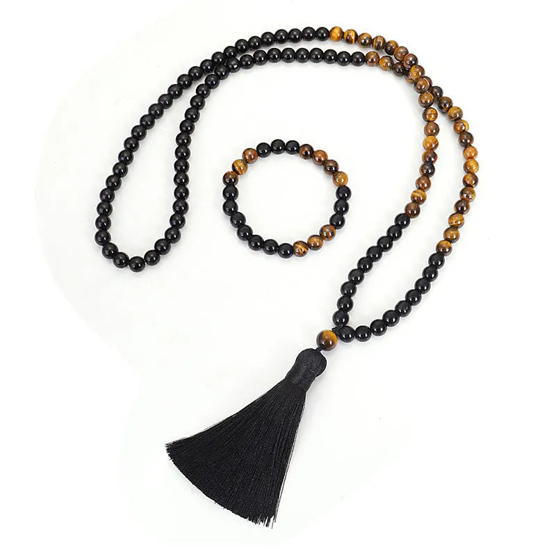 Tiger eye stone drop pendant necklace with tassel detailing on 81cm adjustable chain