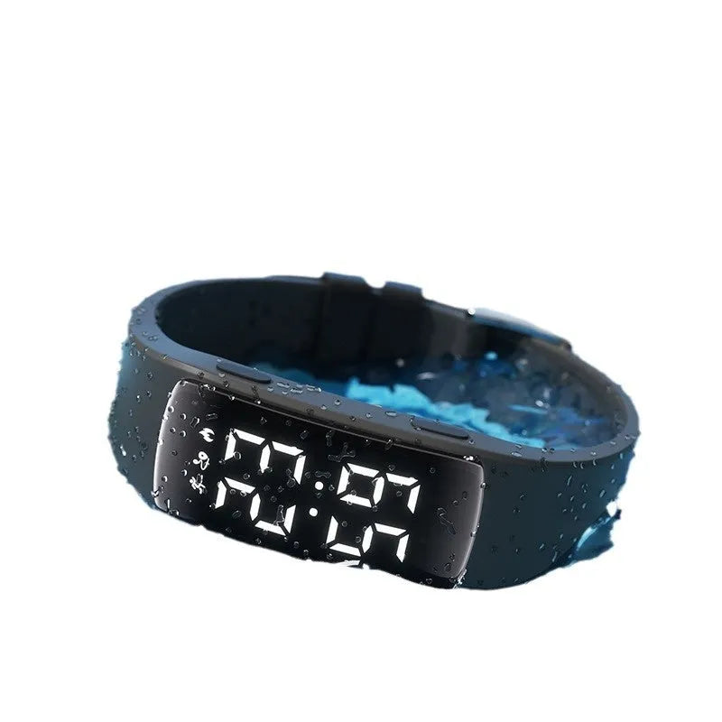 Electronic vibration alarm watch with LED display and silicone strap showing waterproof rating of 50 metres