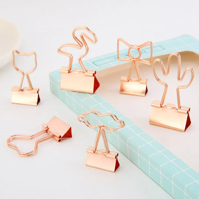 Gold metal decorative paper clip with long tail design in various shapes including flamingo, love and cat