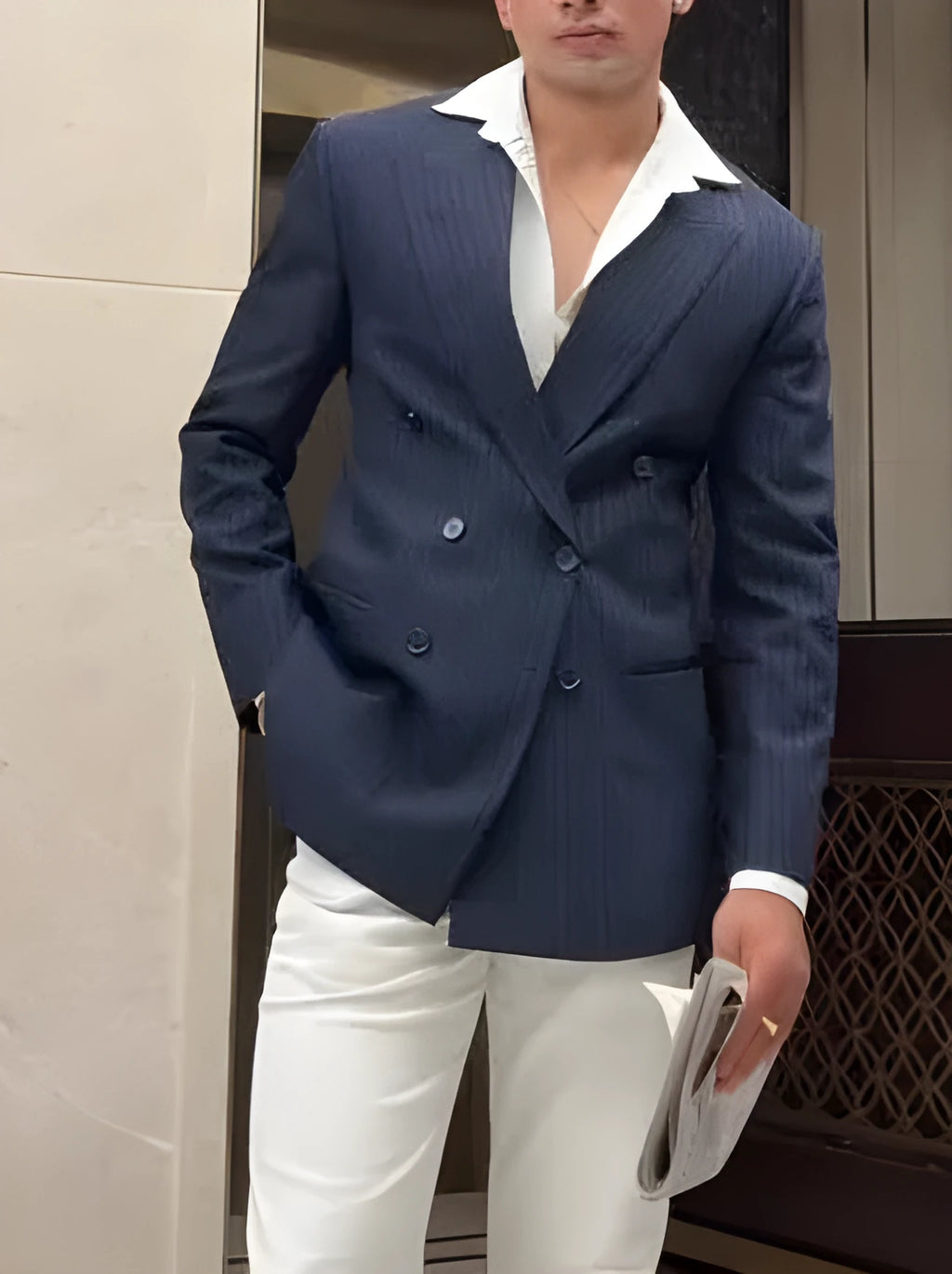 Men's striped double-breasted polyester blazer showing classic design and regular fit