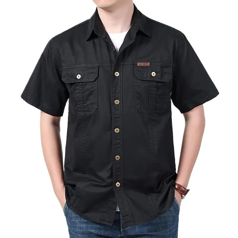 Men's cotton short sleeve loose fit cardigan shirt in dark blue on a model, summer workwear style