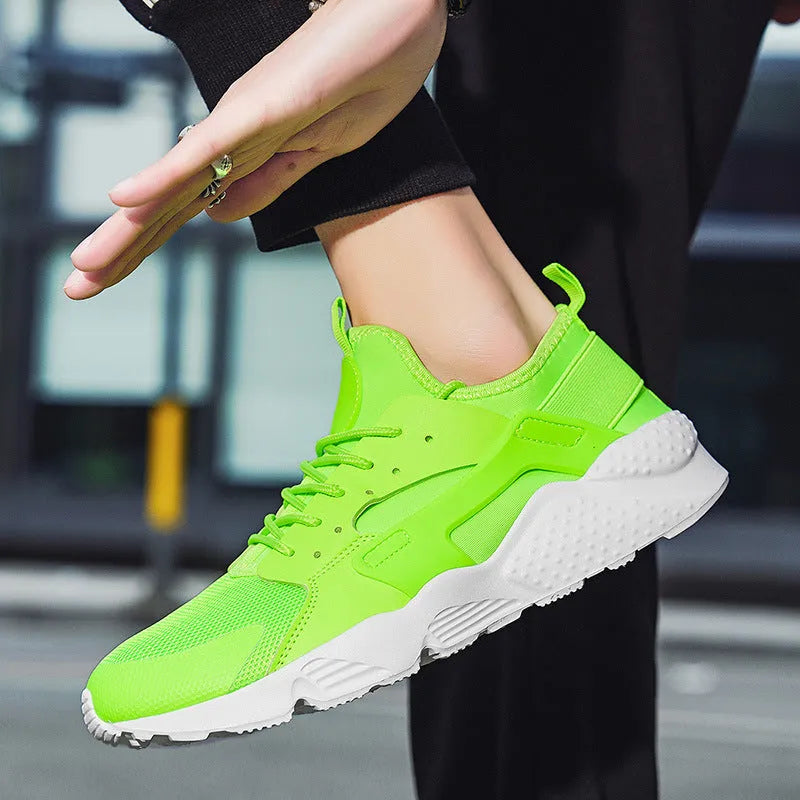 Men's casual low top shoes with mesh upper, cross straps, and flat heel in multiple colours