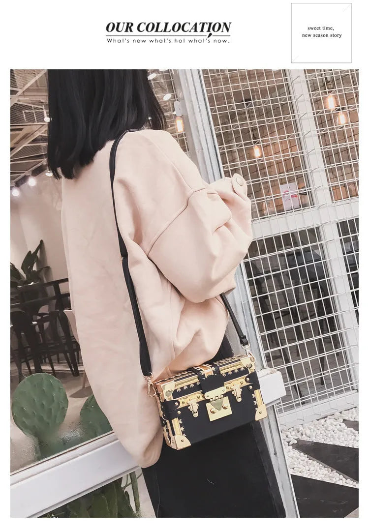 Women's black PU leather hard flap shoulder bag with decorative rivets and hasp closure