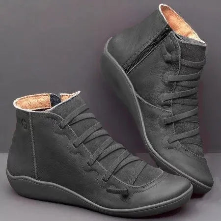 Women's casual ankle booties with synthetic PU upper and flat wedge heel in multiple colours
