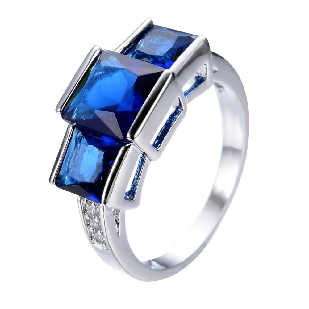 Copper women's ring with electroplated colour finish in geometric design showing multiple colour options