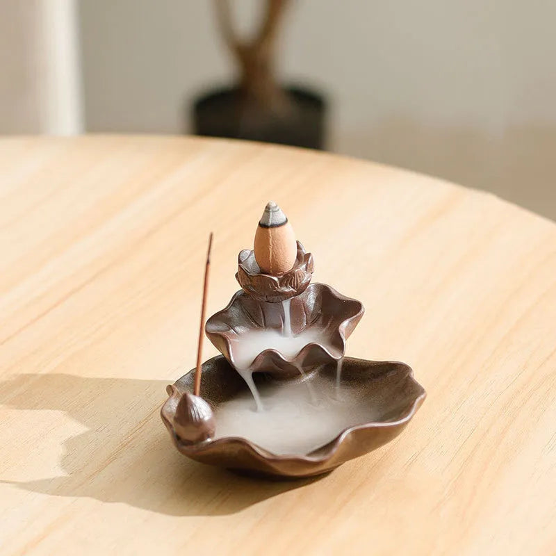 Square ceramic reverse flow incense burner with lotus and plum blossom decorative motifs