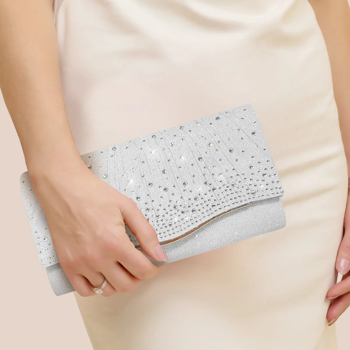 Women's dinner clutch bag in woven fabric with rhinestone dress garment design, available in black, champagne, and silver