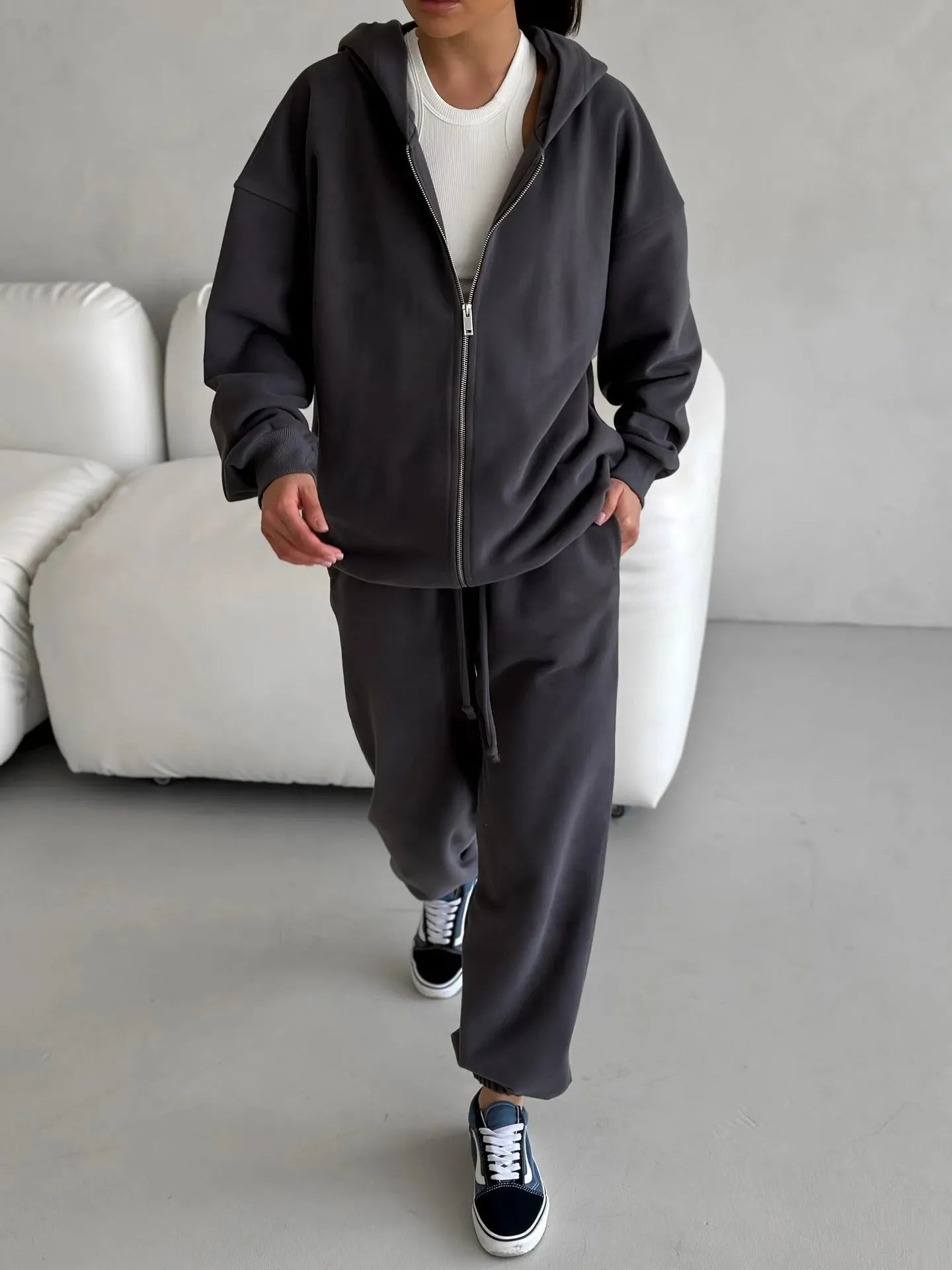Street style two-piece set featuring long-sleeved coat and matching trousers in loose fit