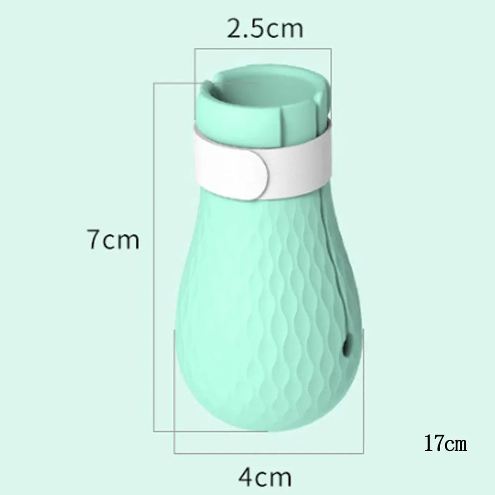 Four green silicone cat anti-scratch foot cover gloves for hand protection during washing and feeding